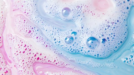 Soft hues of pink and blue blend beautifully in a thick layer of soap foam, with delicate bubbles rising to the surface, capturing a whimsical and serene atmosphere