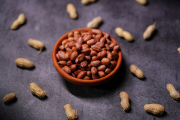 There are peanuts in a bowl.