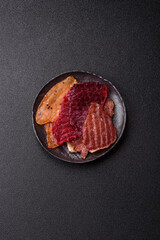 Jerky, dried meat in the form of slices with salt, spices and herbs