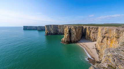 Obraz premium Coastal cliffs, turquoise water, sandy beach. Panoramic view. Suitable for travel brochures or nature websites.