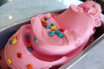 artisanal bubblegum gelato with sprinkles