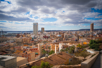 Fototapeta premium View on Alicante, Spain from the fortress Santa Barbara, Rooftop view of the old town of Alicante City. Panorama from the walls of the castle of Santa Barbara.