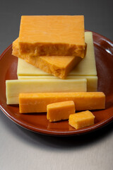 British cheeses collection, Scottish coloured and English matured cheddar cheeses