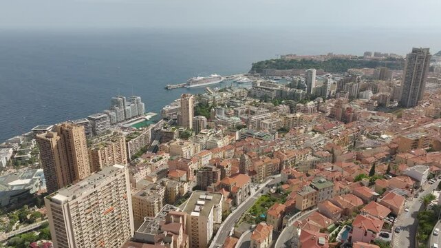 aerial view of Monaco with skyscrapers, the harbor and the Mediterranean Sea