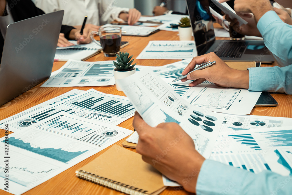 Aufkleber diverse group of business analyst team analyzing financial data report paper on office table. chart 