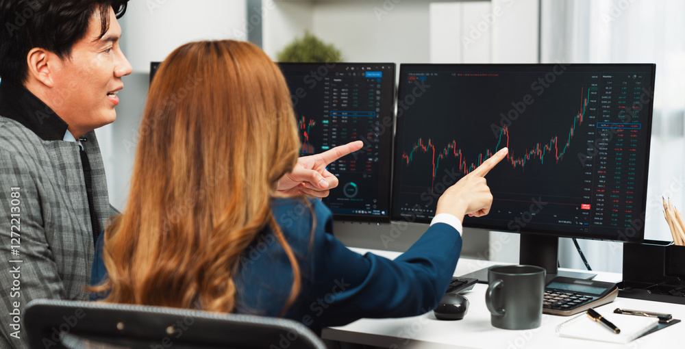 Poster panoramic photo asian business partners pointing to dynamic stock exchange data on computer screen v