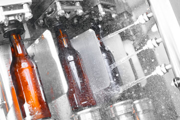 Automated beer bottling process for sterilization and disinfection in modern brewery facility