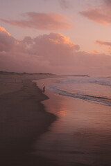 Kid playing by the sea