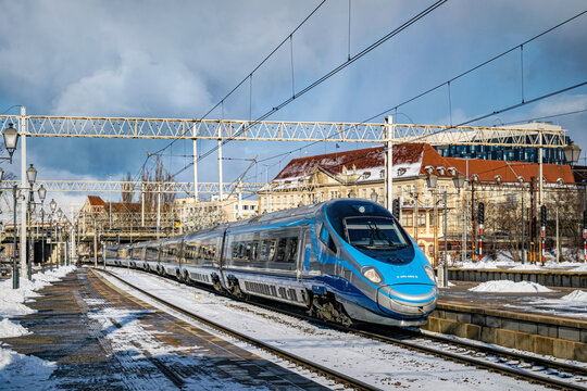 Train departure from the railway station in Gdansk. High speed Pendolino train
