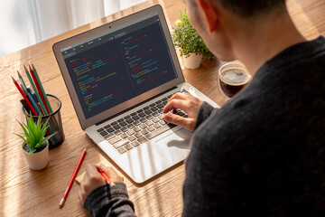Software development programming on computer screen for modish application and program coding