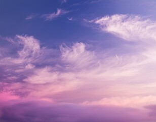 Obraz premium A gentle, dreamy sky with a gradient of pink and purple shades, adorned with wispy white clouds.