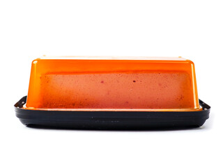 Portion of pate on black plastic tray and white color background. Premium high quality meat...