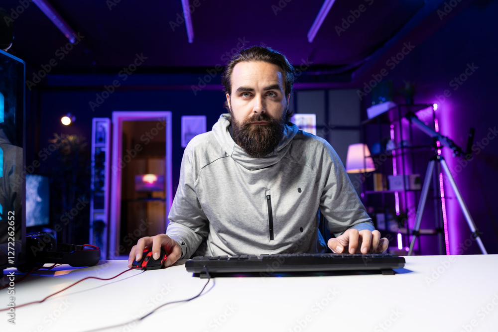 Aufkleber focused man using gaming mouse and keyboard to shoot enemies in videogame. gamer using powerful pc a