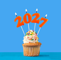 Candle number 2027 for happy new year - New years eve celebration on blue background