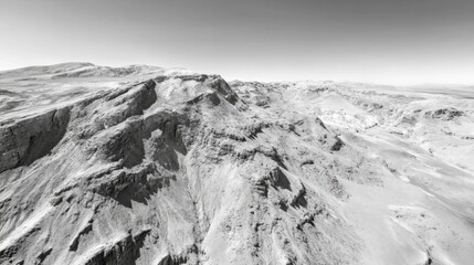 Obraz premium Stunning Black and White Aerial Photography of Rugged Mountain Landscapes and Desolate Wilderness