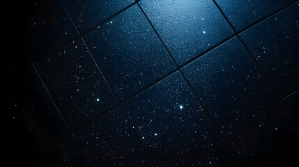 Naklejka premium Dark blue tiled ceiling, illuminated, star-like speckles, nighttime setting, background blur, website design