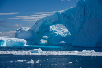 Antarctic Peninsula iceberg, dramatic icy landscape.