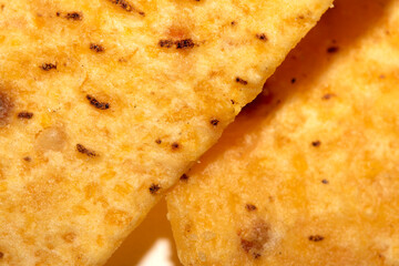 Close Up of Nacho Corn Crisp Chip Triangle Shape Snack