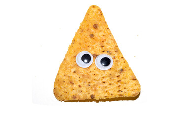 Close Up of Nacho Corn Crisp Chip Triangle Shape Snack With Funny Eyes