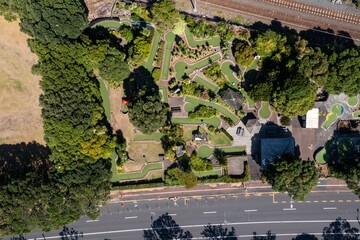 Aerial view of a mini golf course, Sunny day, park maintenance. Tamaki Drive, Auckland, New Zealand