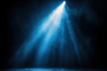 Theatrical Spotlight Beam on Dark Stage with Blue Hues and Shadows