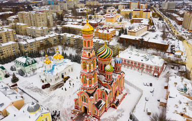 Top view of the Ascension monastery and residential areas in winter in the city of Tambov...