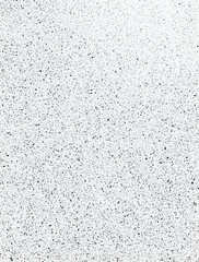 Obraz premium Subtle speckled texture on a bright surface, ideal for adding depth and visual interest to backgrounds and graphic designs, versatile use