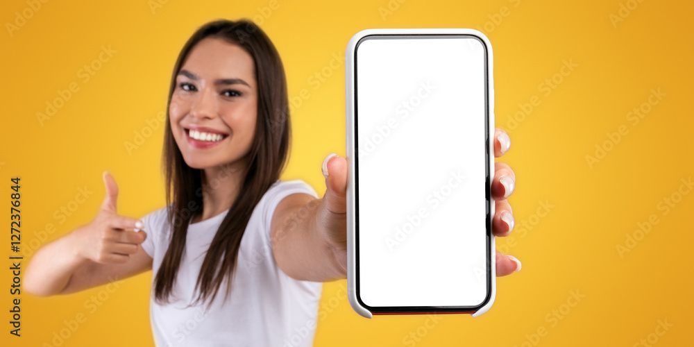 Leinwandbilder i recommend. portrait of smiling woman holding smartphone with white blank screen in hand, showing a
