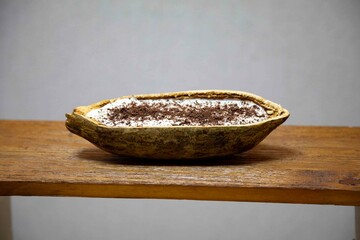 Traditional cupuaçu cream, cupuaçu mousse served in the fruit shell with grated chocolate