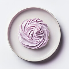 Elegant lavender cream swirl on a smooth, round plate, creating a visually appealing dessert presentation.