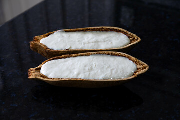 Traditional cupuaçu cream, cupuaçu mousse served in the fruit shell with grated chocolate