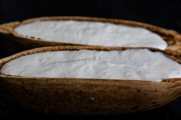 Traditional cupuaçu cream, cupuaçu mousse served in the fruit shell with grated chocolate