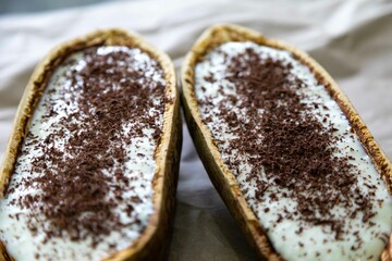 Traditional cupuaçu cream, cupuaçu mousse served in the fruit shell with grated chocolate