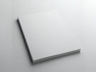 A close-up of a blank white magazine cover, textured paper, ready for your design.