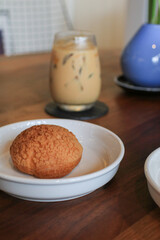 Craquelin Choux biscuits filled vanilla and milk custard on wooden table. Fresh Baked Bakery for coffee break or party