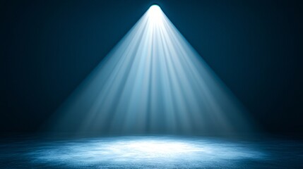 Blue spotlight illuminating dark stage