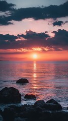 Fototapeta premium Dramatic Seascape at Dusk with Horizon Illumination Over Water