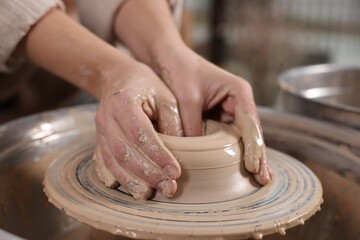 Hobby and craft. Woman making pottery indoors, closeup