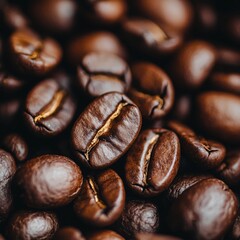 Naklejka premium Close-up of roasted coffee beans showcasing rich textures and deep brown colors