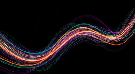 Colorful light trails create abstract waves against black background