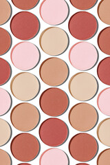 Eyeshadow palette, mix of matte shades in neutral beige brown hues. Minimal view pattern for beauty, makeup, cosmetic themes, Vivid nude skintone colored swatches eyeshade refills round shape