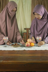 two girl preparing iftar during ramadan