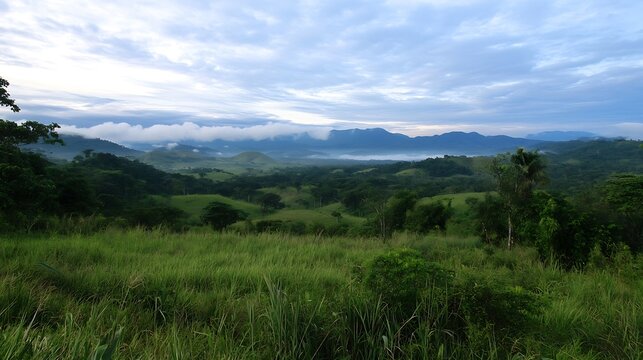 Scenic view of green hills and mountains under a cloudy sky in a tranquil natural landscape : Generative AI