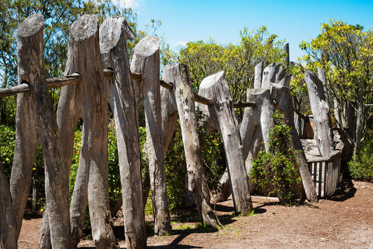 Old wooden arch walkway at Royal Botanic Gardens Cranbourne, Cranbourne, Victoria, Australia