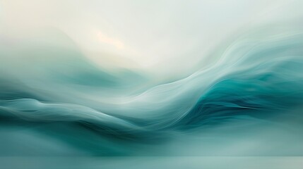 An abstract blur of cool blue and green tones swirling together, forming a misty, cloud-like formation on a white background.