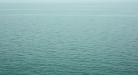 AI image the serene teal ocean stretches to meet the misty horizon, creating a calming and expansive seascape scene.