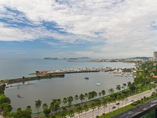 View of a harbor and the Causeway in Panama City, Panama.