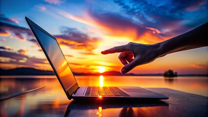 Silhouette of Hand Hovering Over Submit Button on Laptop Screen