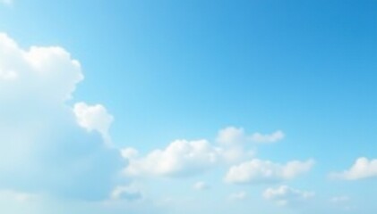 Soft blue sky with white clouds drifting lazily across it, peaceful, serene, nature