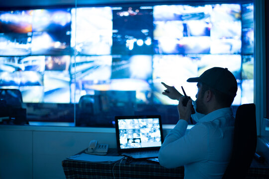 The CCTV officer communicated via walkie-talkie to the security guard to go and inspect the area on monitors